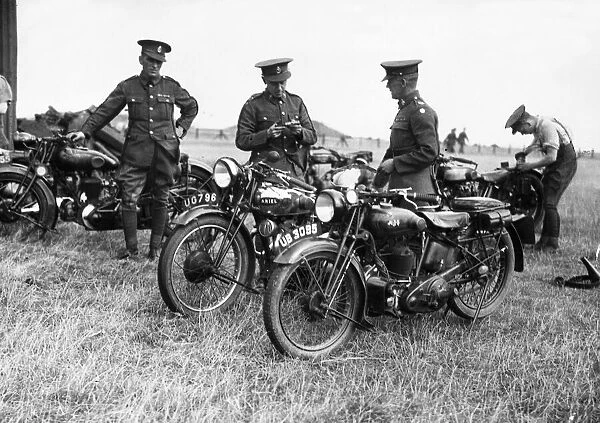 Dispatch riders of the Royal Signals prepare their motorcycles for next week