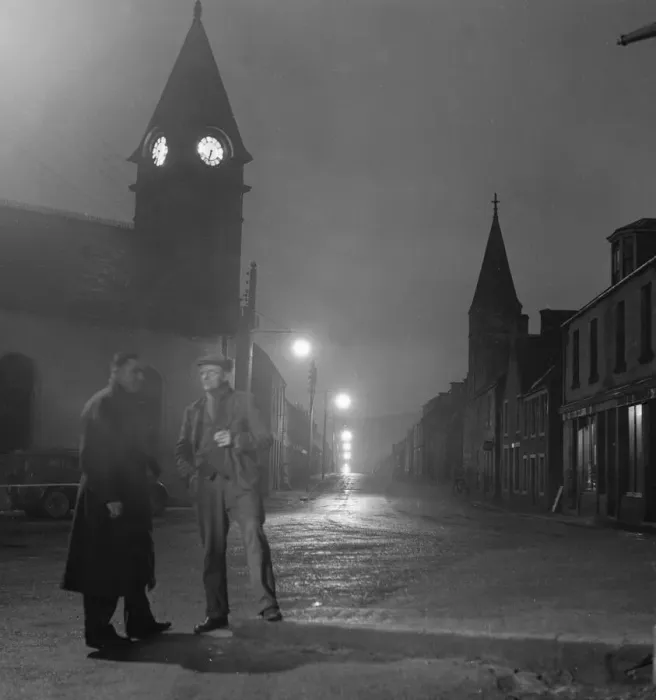 Framed Print : Two distillery workers seen here in Rothes High Street about to say goodnight after a Framed Print : Two distillery workers seen here in Rothes High Street about to say goodnight after a