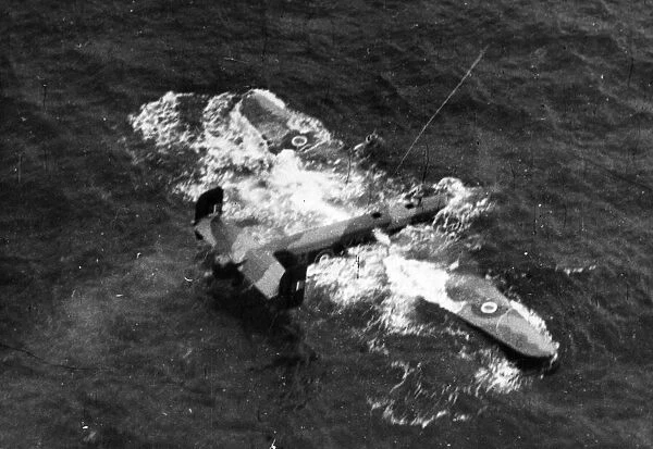 Ditched Halifax bomber in the Atlantic, rescued by the crew of the merchant ship '