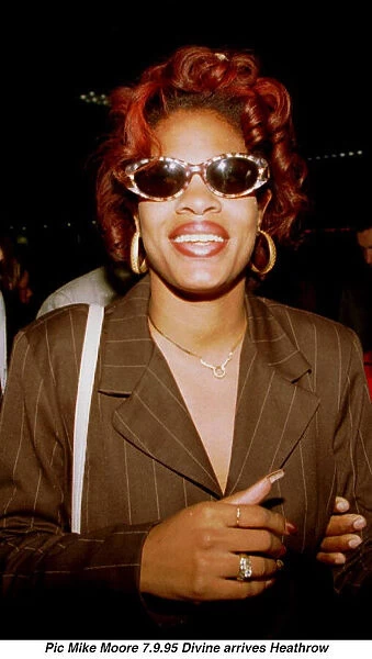 Divine Brown prostitute who was caught with Hugh Grant in a car in Los Angeles arrives at