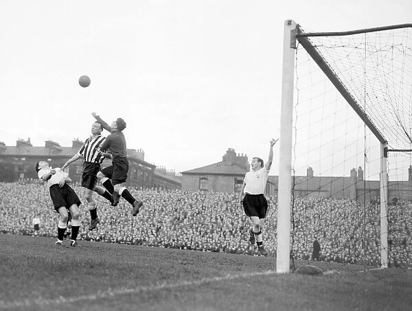 Division One Newcastle United v Derby County. Derby County goal keeper punches away a