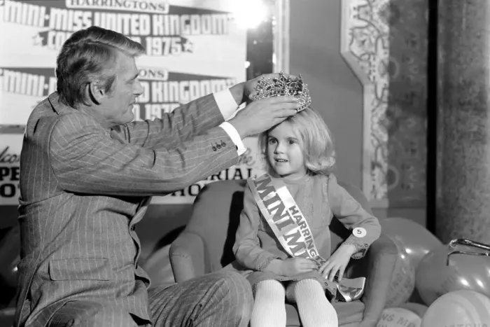 Framed Print : DJ Pete Murray seen here crowning the winner of the Mini Miss UK beauty competition