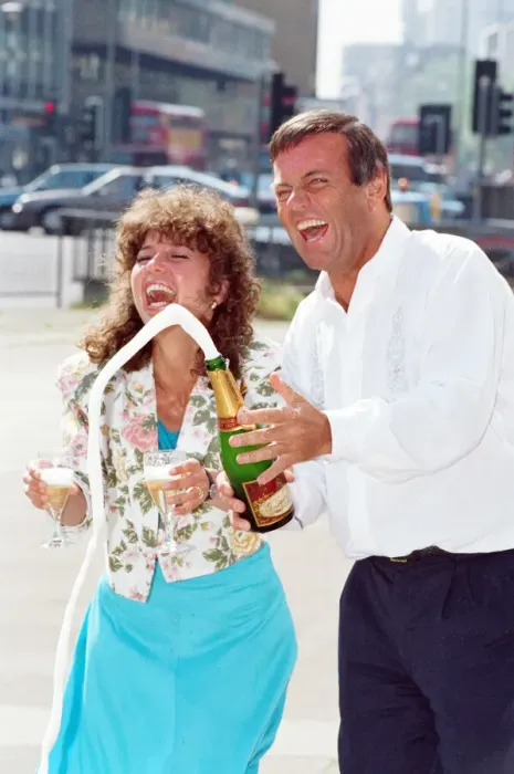 Framed Print : DJ Tony Blackburn and Debbie Thomson celebrate their engagement. 29th July 1991