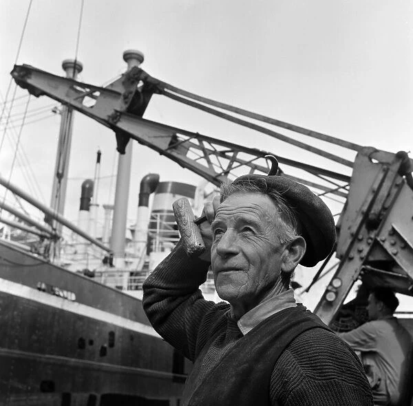 Dockers loading a ship at Gladstone Dock, Liverpool. Pictured is Danny Cull, 67