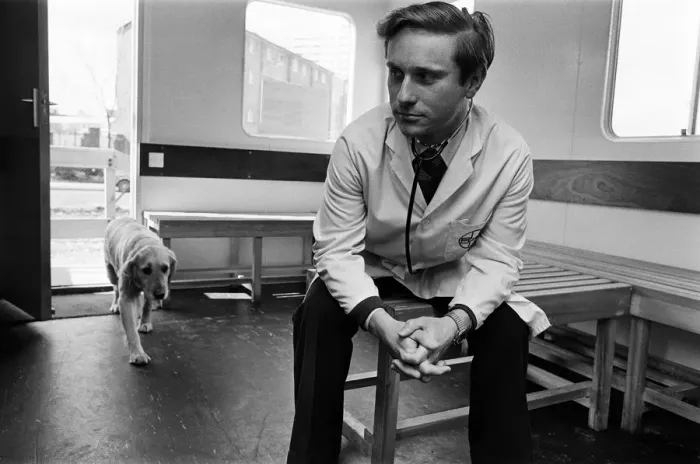 Framed Print : Its a dog life for this Birmingham vet. He is stationed in a mobile hut on land in