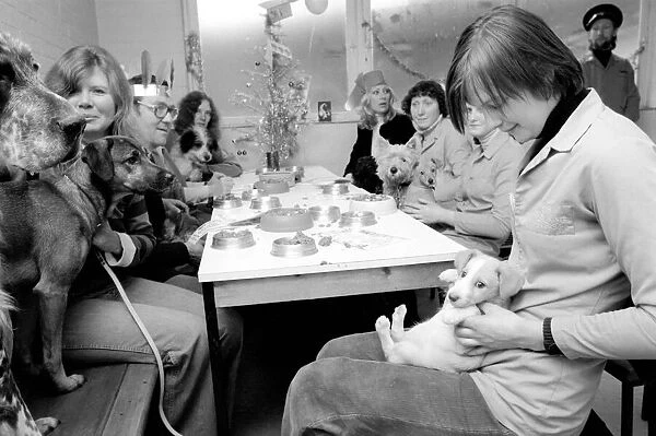 Dog Owners and their pets seen here having a Christmas party. December 1976 76-07481-014