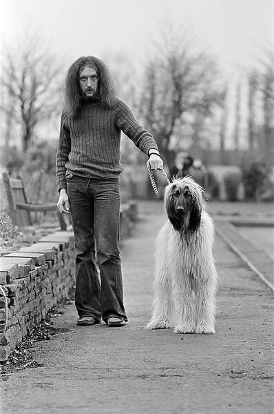 A dog who looks like its owner. 1975