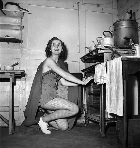 Domestic scene, woman in the kitchen. March 1952 C1252