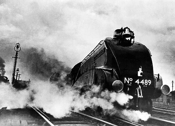 Dominion of Canada steam locomotive June 1938 leaving London Kings Cross for