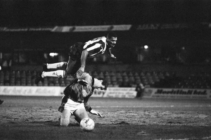 Framed Print : Don Goodman of West Bromwich Albion flies over Leicester City goalkeeper Hodge during Framed Print : Don Goodman of West Bromwich Albion flies over Leicester City goalkeeper Hodge during