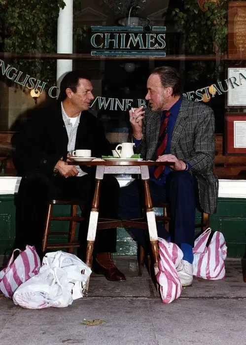 Framed Print : Don Henderson Actor & Michael Elphick actor sitting at pavement cafe table with shopping Framed Print : Don Henderson Actor & Michael Elphick actor sitting at pavement cafe table with shopping