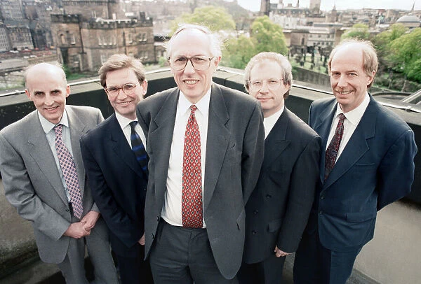 Donald Dewar, Scottish Secretary of State, pictured with his new team, Sam Galbraith