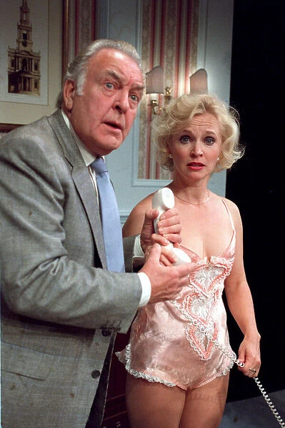 DONALD SINDEN AND SANDRA DICKINSON IN THE STAGE PLAY OUT OF ORDER