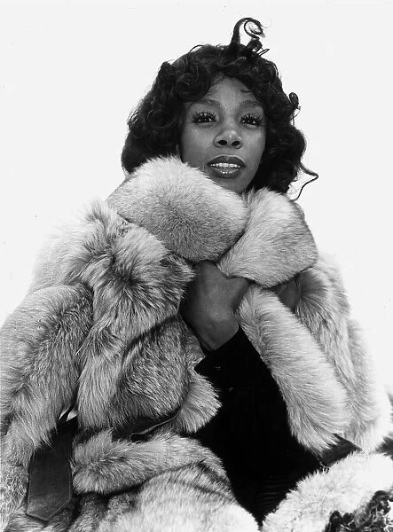 Donna Summer, arriving at London Heathrow Airport to promote the record Love Trilogy