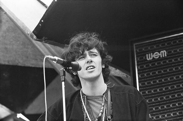 Donovan performing on stage at the 1967 National Jazz and Blues Festival at Royal