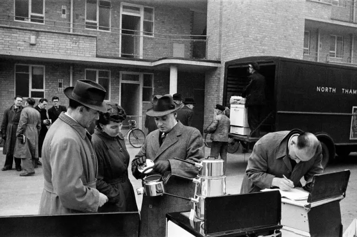 Framed Print : Door to Door Salesmen sell Domestic Appliences to homeowners in London