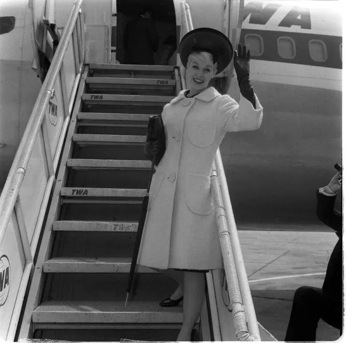 Framed Print : Dorothy Provine actress waves from aircraft steps June 1962