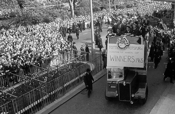 A double decker bus carries the team holding the European Cup Winners Cup Winners trophy