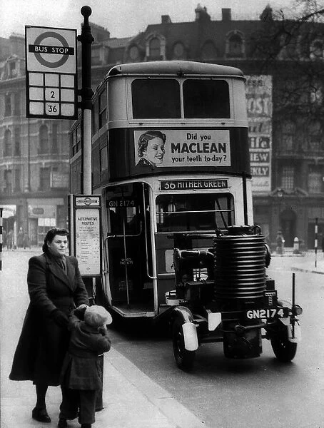 A double decker bus with a fuel trailer attached - March 1943 London Transport try
