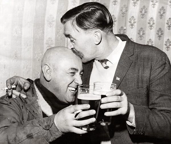 Doug Holberry and Len Phillips - November 1968 celebrate with a couple of pints of