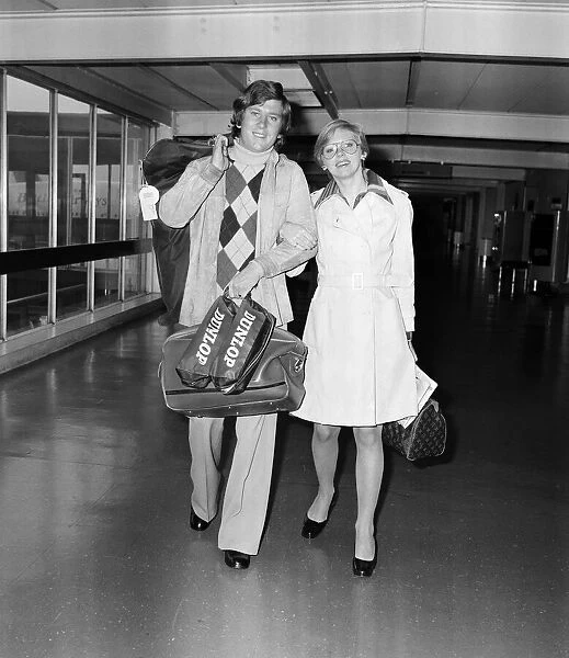 Doug McClelland, Dutch Open Champion, with wife Suzie, at London Heathrow Airport