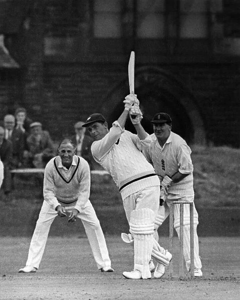 Doug Padgett, Yorkshire batsman, hitting a six during charity match