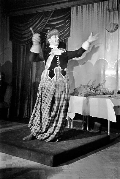 Douglas Byng Comedian Seen here performing on stage 1938. January 1938 OL305A-003