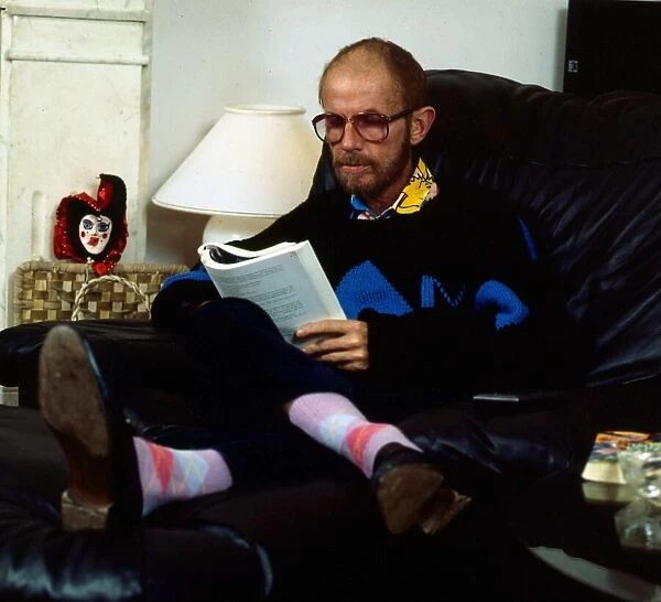 Douglas Lambert sitting at home, November 1986