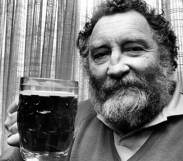 Dr David Bellamy with a pint of beer on 20th February 1981
