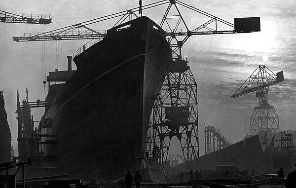 A dramatic sunset at one the River Tynes shipyards in 1948