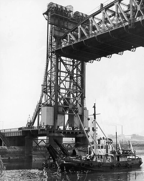 The dredger Wilton seen here passing under the Newport lifting bridge. 9th July 1971