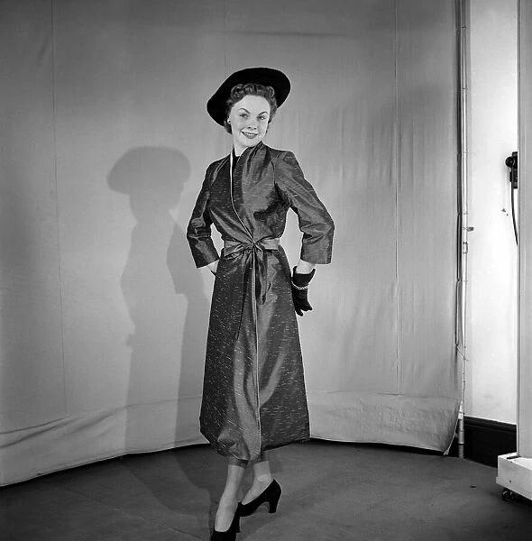 Dress coat fashions. March 1953 D1945-001