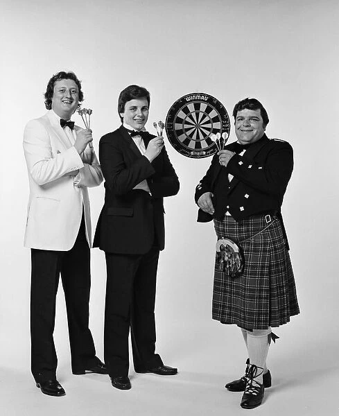 Well dressed British darts players pose for a photoshoot