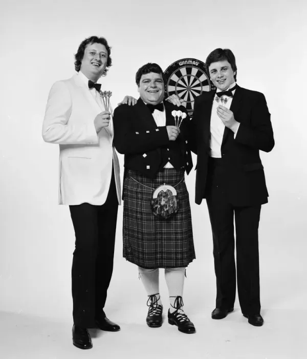 Framed Print : Well dressed British darts players pose for a photoshoot Framed Print : Well dressed British darts players pose for a photoshoot