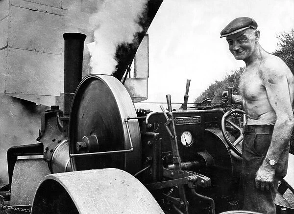 Driver Gerald Shortt and his steam roller at Beamish Open-Air Museum