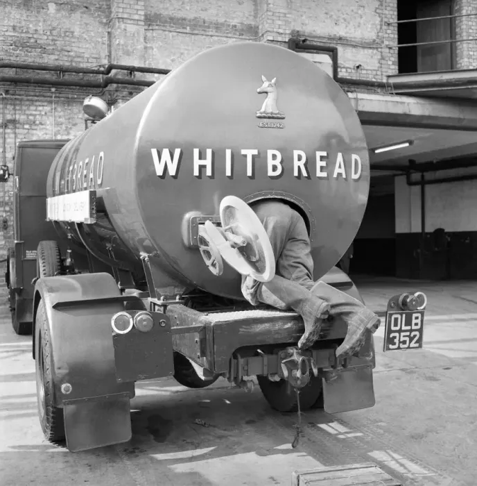 Framed Print : Driver and his mate: Clean inside of beer tanker at the Whitbread brewery