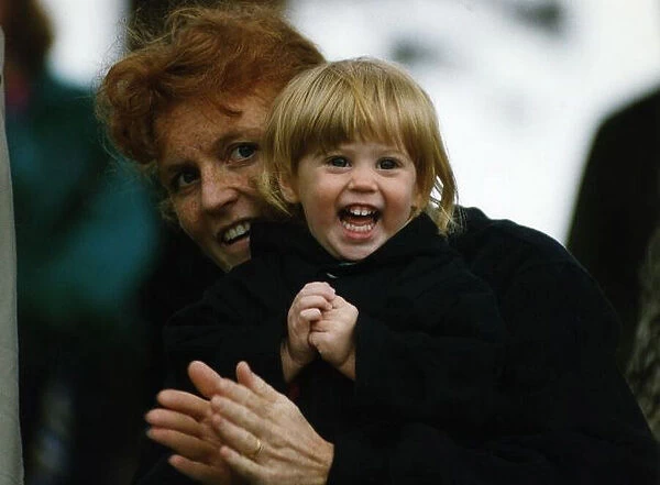 Duchess of York holds Beatrice tightly after having her pigtails pulled