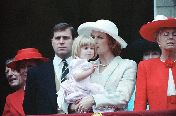 The Duchess of York, Sarah Ferguson, holds her three year old daughter Princess Beatrice