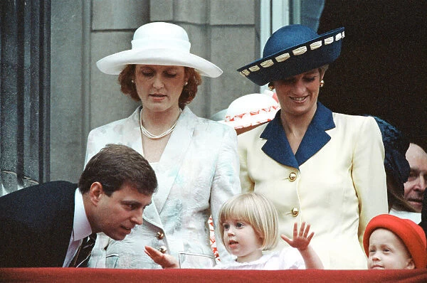 The Duchess of York, Sarah Ferguson, holds her three year old daughter Princess Beatrice
