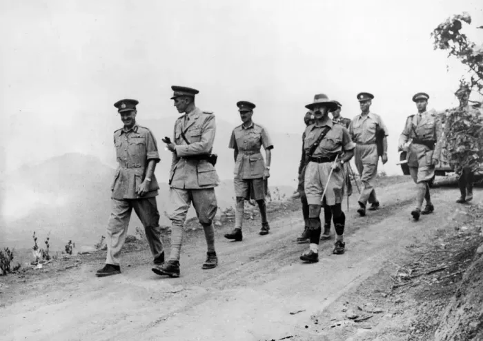 Framed Print : The Duke of Aosta (in front, right) escorted from the cave where he lived in Framed Print : The Duke of Aosta (in front, right) escorted from the cave where he lived in