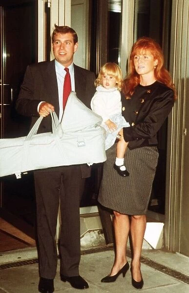 Duke And Duchess Of York with their Children Beatrice and Eugenie in her Carry-Cot