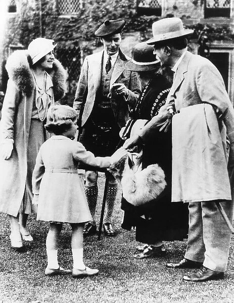 The Duke and Duchess of York at Glamis Castle August 1931 with Princess Elizabeth