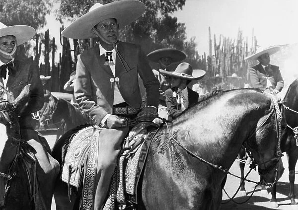 The Duke of Edinburgh in the costume of a Cowboy, when he broke his nine-day tour of