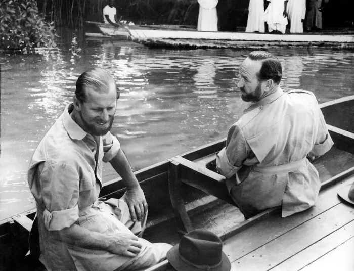 Framed Print : The Duke of Edinburgh Feb 1957 and Lt. Commander Michael Parker in a canoe at Gambia Framed Print : The Duke of Edinburgh Feb 1957 and Lt. Commander Michael Parker in a canoe at Gambia