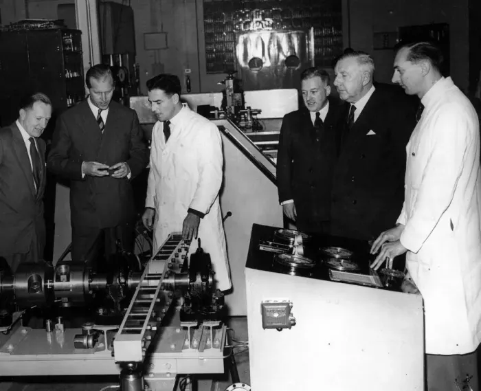 Framed Print : The Duke of Edinburgh inspects a machine for load-testing splines in the laboratory of Framed Print : The Duke of Edinburgh inspects a machine for load-testing splines in the laboratory of
