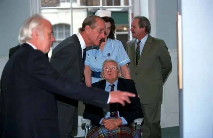 Framed Print : The Duke of Edinburgh, Prince Philip with Cartoonist Carl Giles at exhibition of Framed Print : The Duke of Edinburgh, Prince Philip with Cartoonist Carl Giles at exhibition of