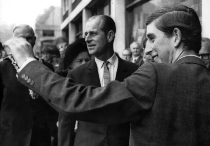 Framed Print : The Duke of Edinburgh. Prince Philip & Prince Charles pictured just after a smoke bomb Framed Print : The Duke of Edinburgh. Prince Philip & Prince Charles pictured just after a smoke bomb