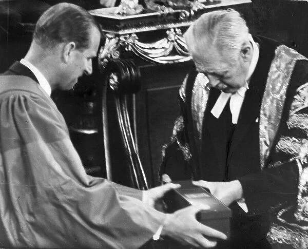 The Duke of Edinburgh. Prince Philip receives his doctor of civil law scroll from Oxford