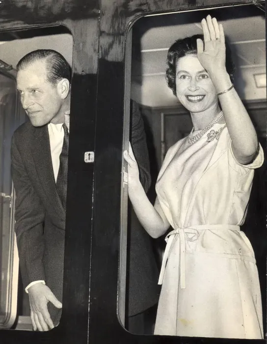 Framed Print : The Duke of Edinburgh, Prince Phillip and Queen Elizabeth II wave to the crowds as they Framed Print : The Duke of Edinburgh, Prince Phillip and Queen Elizabeth II wave to the crowds as they