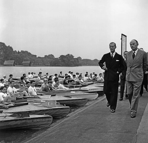 The Duke of Edinburgh reviews the canoes of the Boys Clubs of London at The Serpentine